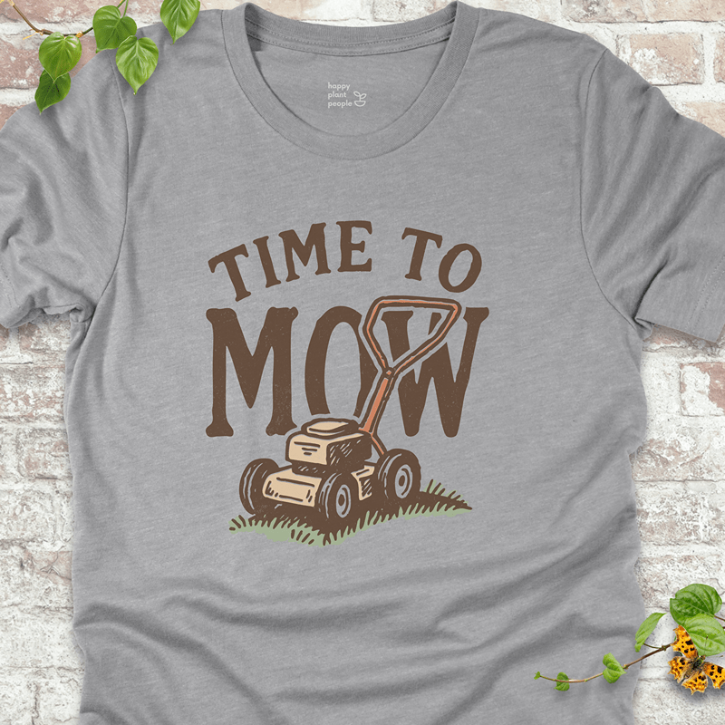 Unisex Bella+Canvas T-shirt in Athletic Heather with vintage-style "Time to Mow" graphic and push mower illustration. Lightweight and breathable for lawn lovers.