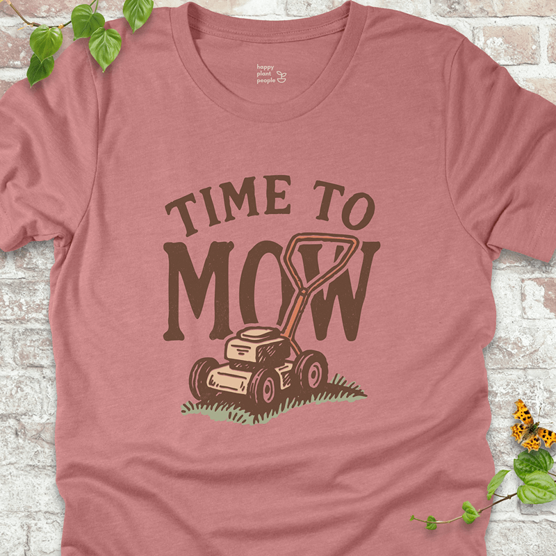 Unisex Heather Mauve T-shirt with fun retro mower design and bold lettering. Great lightweight tee for cozy gardeners and outdoor days.