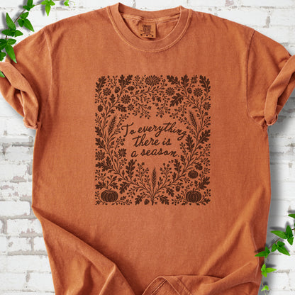 Yam Comfort Colors® T-shirt flat lay with botanical To Everything There Is a Season Bible verse artwork.