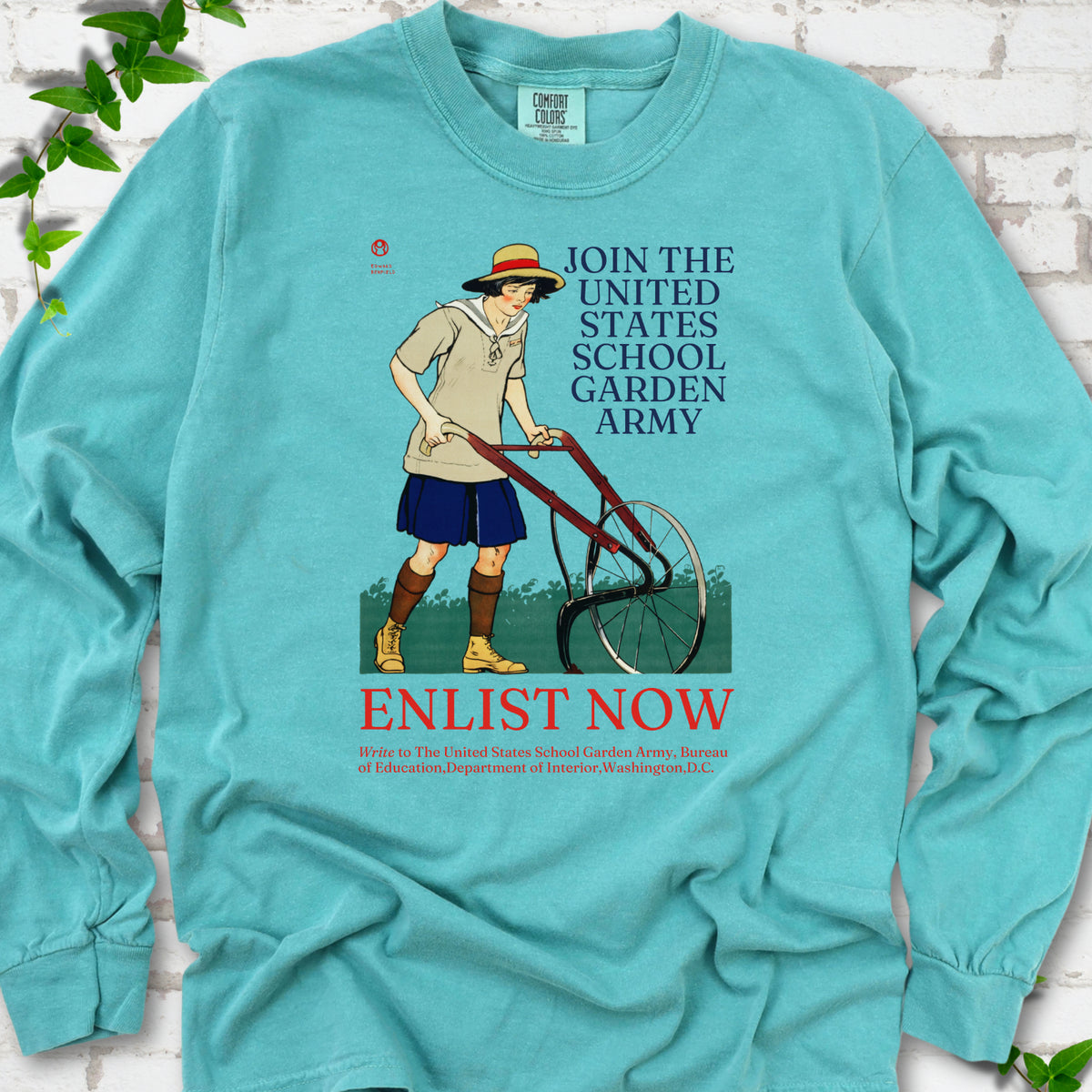 Seafoam Comfort Colors® long sleeve shirt featuring Edward Penfield’s 1918 School Garden Army poster with a young gardener, wheel hoe and “Enlist Now” text.