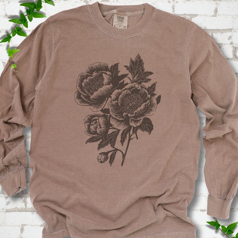 Espresso Comfort Colors® long sleeve T-shirt flat lay featuring vintage-style peony line art.