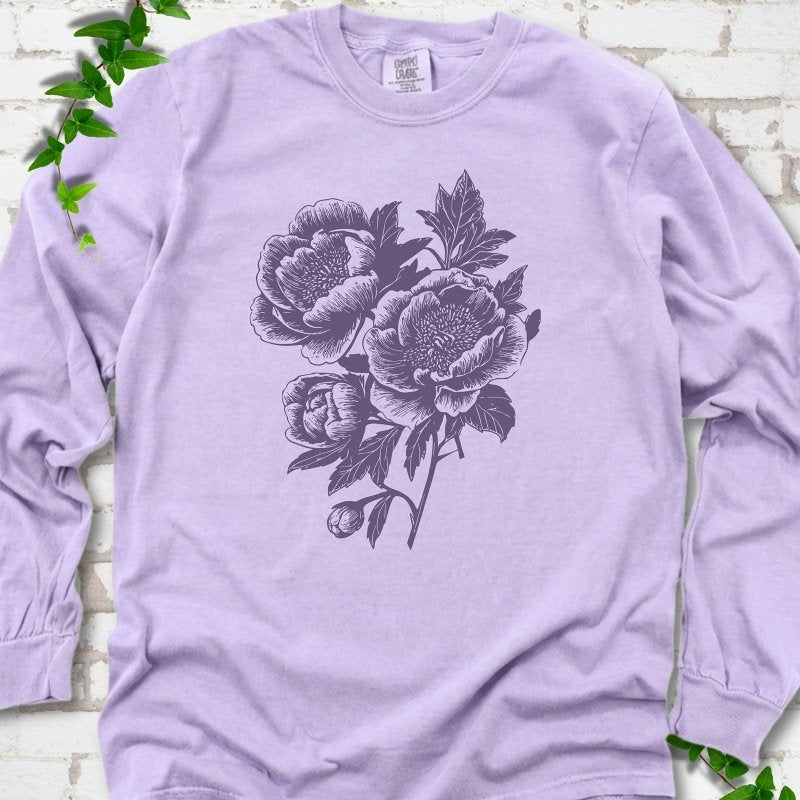 Orchid Comfort Colors® long sleeve T-shirt flat lay featuring vintage-style peony line art.