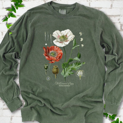 Hemp Comfort Colors® long sleeve T-shirt flat lay featuring vintage botanical poppy studies from bud to seed head.