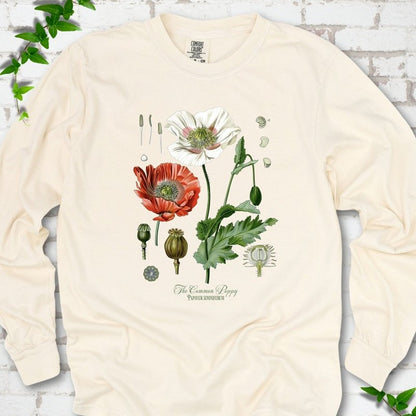 Ivory Comfort Colors® long sleeve T-shirt flat lay featuring vintage botanical poppy studies from bud to seed head.