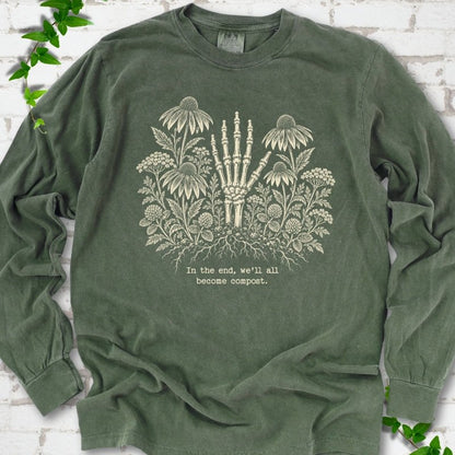 Hemp Comfort Colors® long sleeve T-shirt featuring a cream botanical skeleton-hand graphic reading In the end, we'll all become compost