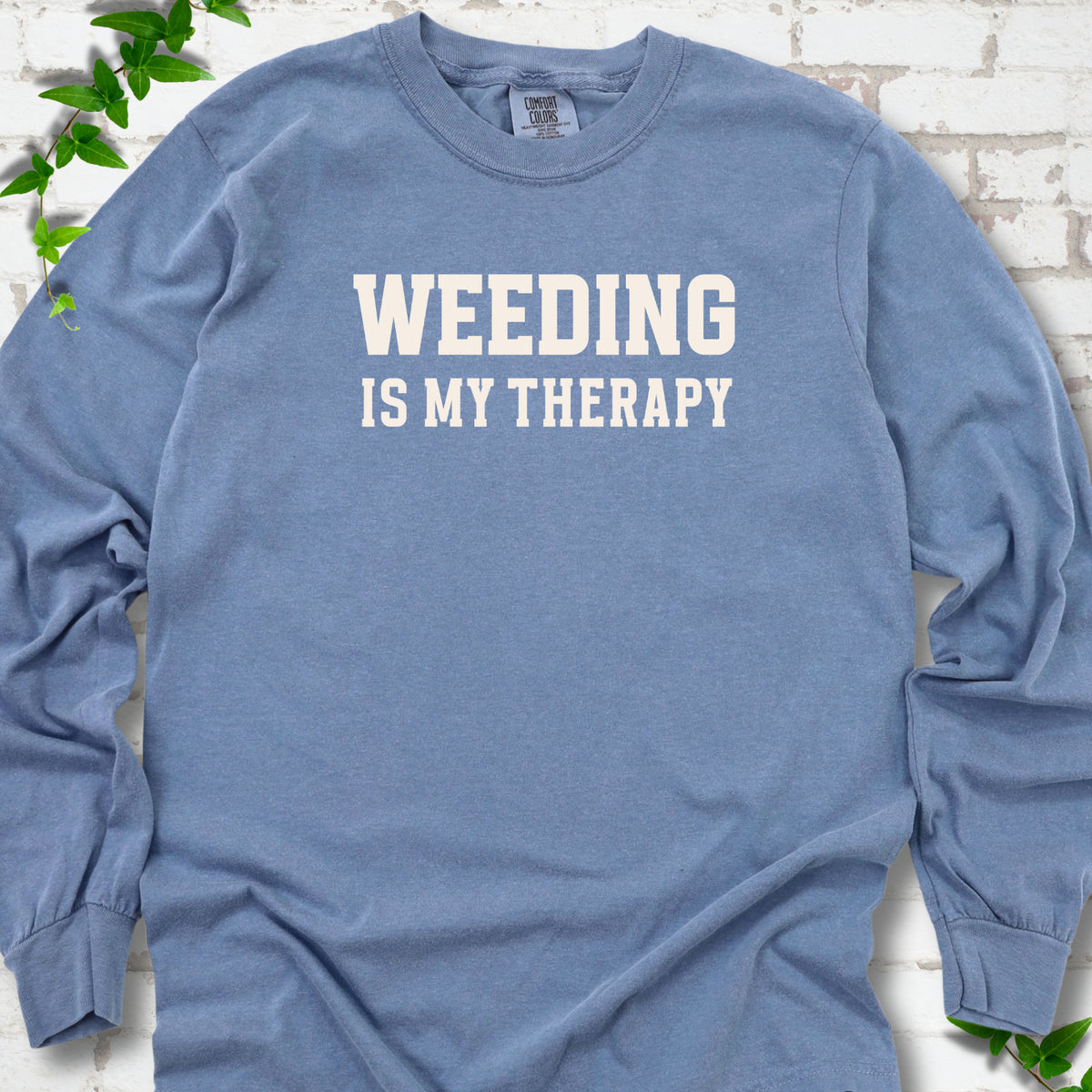 Blue Jean Comfort Colors® long sleeve shirt with Weeding Is My Therapy text design.