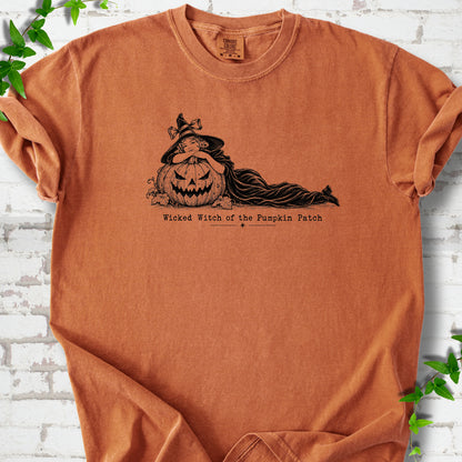 Wicked Witch of the Pumpkin Patch Halloween T-shirt in Yam with witch and jack-o'-lantern graphic