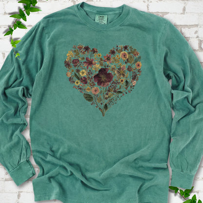 Light Green Comfort Colors® long sleeve T-shirt flat lay featuring a heart formed from delicate wildflowers.
