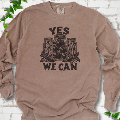 Espresso Comfort Colors® long sleeve T-shirt flat lay featuring preserved tomatoes in jars and the words “Yes We Can.”
