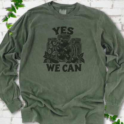 Hemp Comfort Colors® long sleeve T-shirt flat lay featuring preserved tomatoes in jars and the words “Yes We Can.”