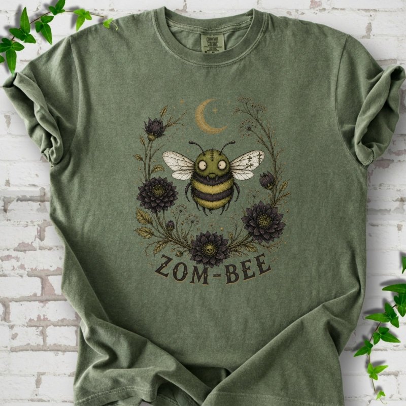 Moss Zom-Bee Gothic Garden Comfort Colors® T-shirt with a zombie bee, crescent moon and dark flowers