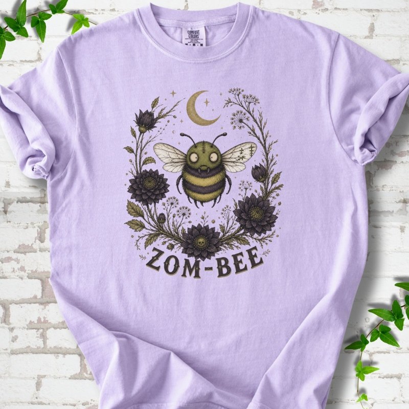 Orchid Zom-Bee Gothic Garden Comfort Colors® T-shirt with a zombie bee, crescent moon and dark flowers