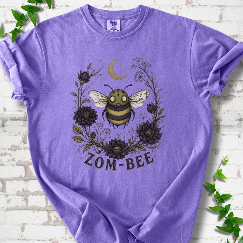 Violet Zom-Bee Gothic Garden Comfort Colors® T-shirt with a zombie bee, crescent moon and dark flowers