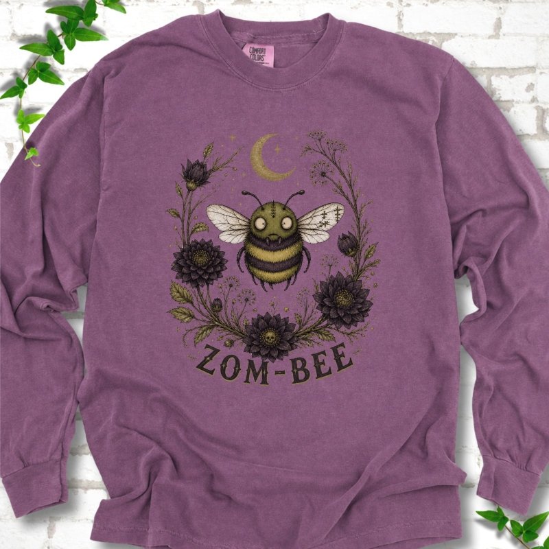 Berry Zom-Bee Gothic Garden Comfort Colors® long sleeve T-shirt with a zombie bee, crescent moon and dark flowers