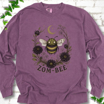 Berry Zom-Bee Gothic Garden Comfort Colors® long sleeve T-shirt with a zombie bee, crescent moon and dark flowers