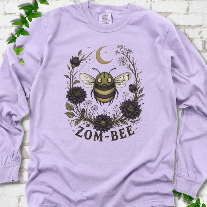 Orchid Zom-Bee Gothic Garden Comfort Colors® long sleeve T-shirt with a zombie bee, crescent moon and dark flowers
