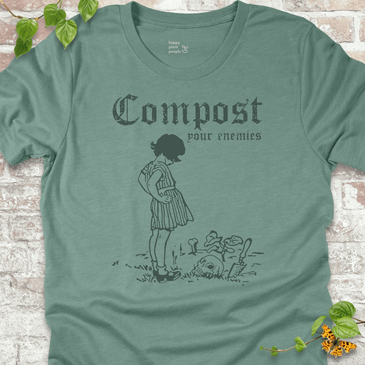 Cozy goth plant shirt in muted blue with skull and vintage plant illustration