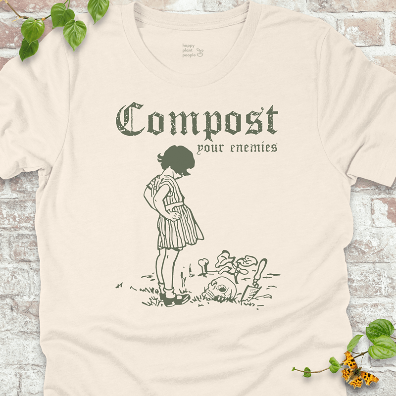 Vintage style Garden witch tee in light beige with skull, shovel, and plant motifs