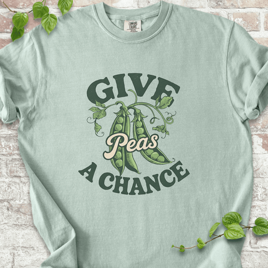 Funny gardening T-shirt with “Give Peas a Chance” design, printed on Comfort Colors™ Bay shirt