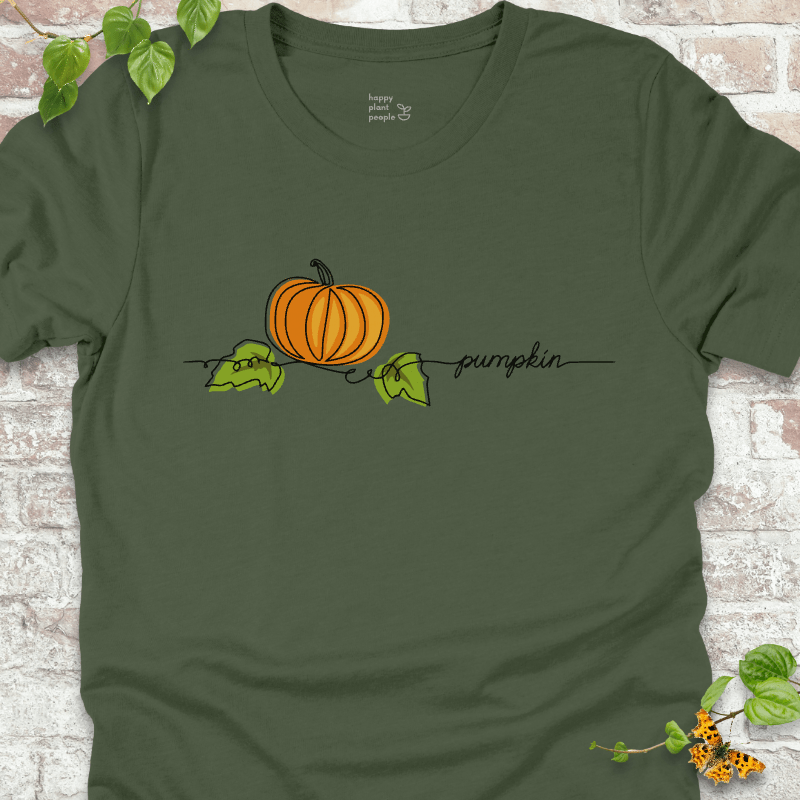 Minimalist pumpkin illustration on a green T-shirt