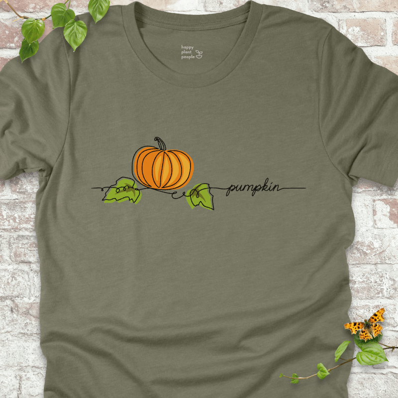 Minimalist pumpkin illustration on an olive green T-shirt