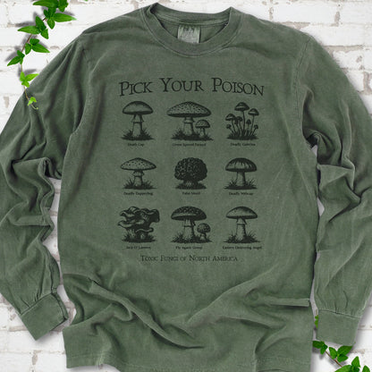 Hemp Comfort Colors® long sleeve T-shirt flat lay featuring a Pick Your Poison field guide of toxic North American mushrooms.