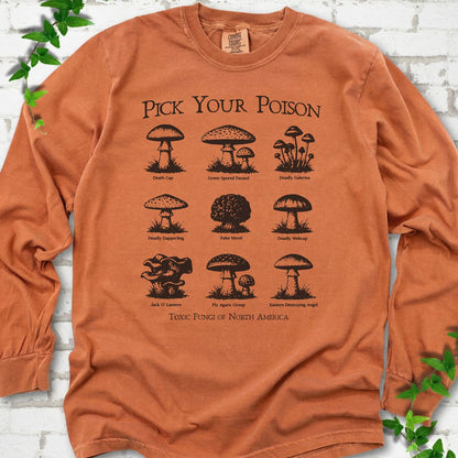 Yam Comfort Colors® long sleeve T-shirt flat lay featuring a Pick Your Poison field guide of toxic North American mushrooms.