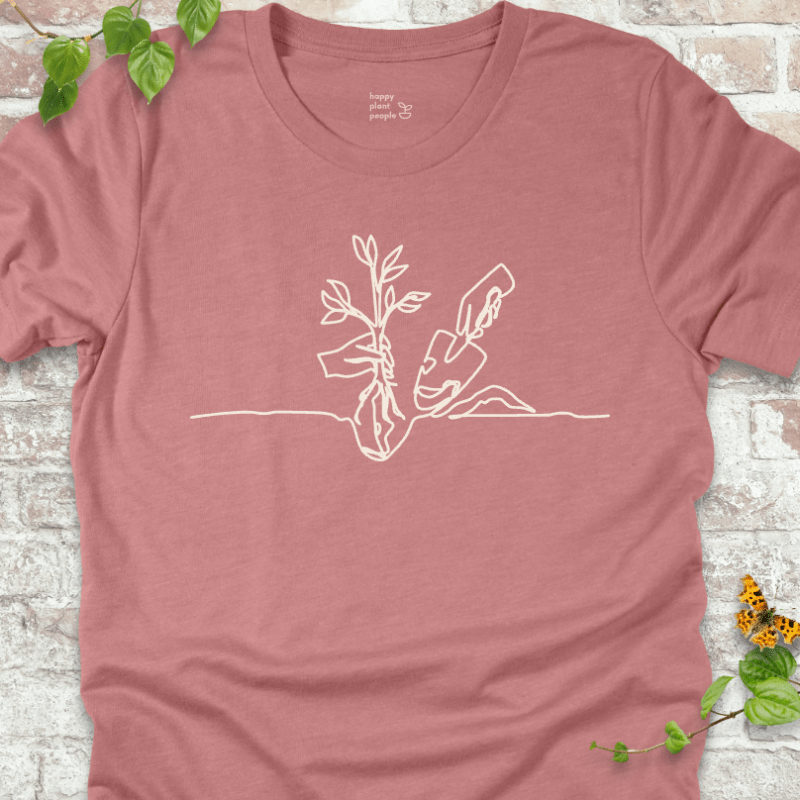 Minimalist planting illustration on a pink T-shirt